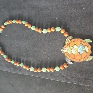 Vintage Lee Sands Turtle With Inlade Of Mother Of Pearl.